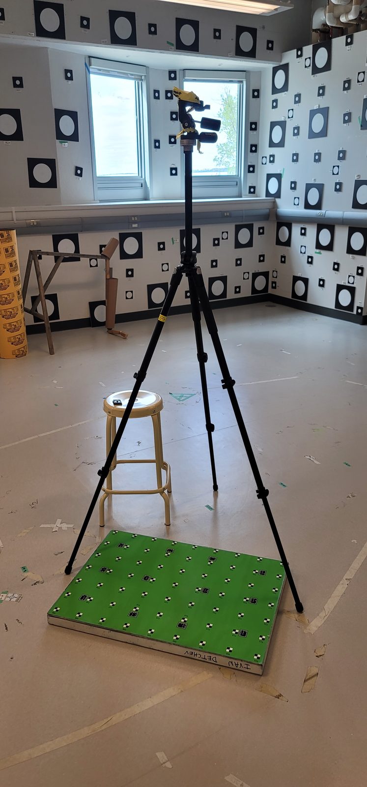 Instrument stands and a calibration board set up among the reference targets.